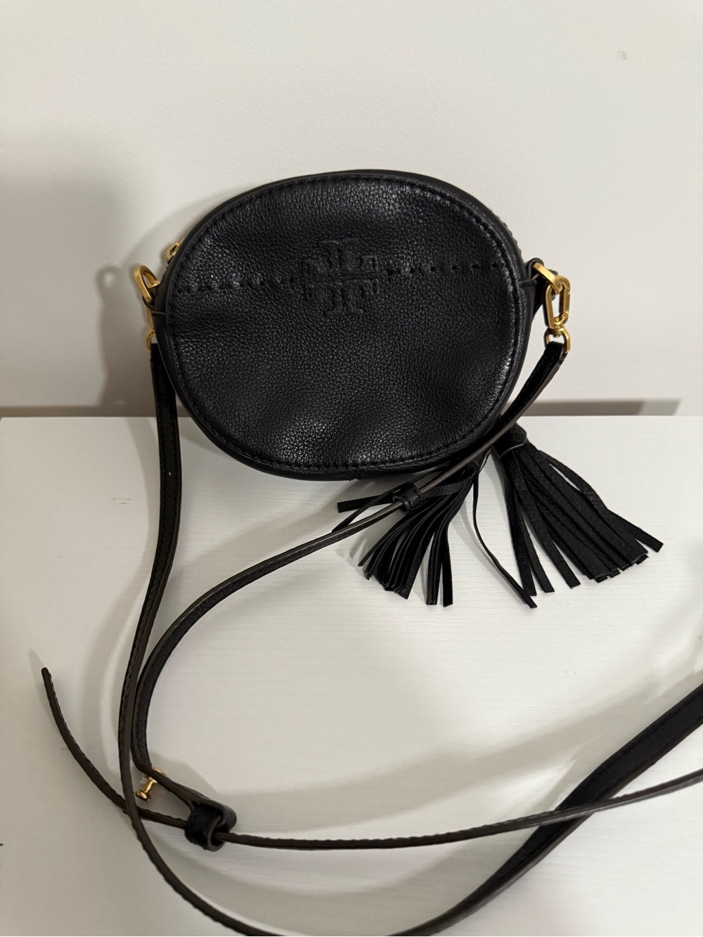 Tory Burch McGraw Black Pebbled Leather Round Crossbody with Tassel